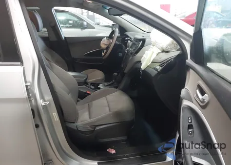 2014 Hyundai Santa Fe Sport 2.4L z USA, uszkodzony, nr VIN 5XYZUDLB8EG173511